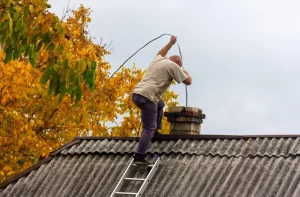 Chimney Cleaning provided by Top Hat Chimney And Roofing