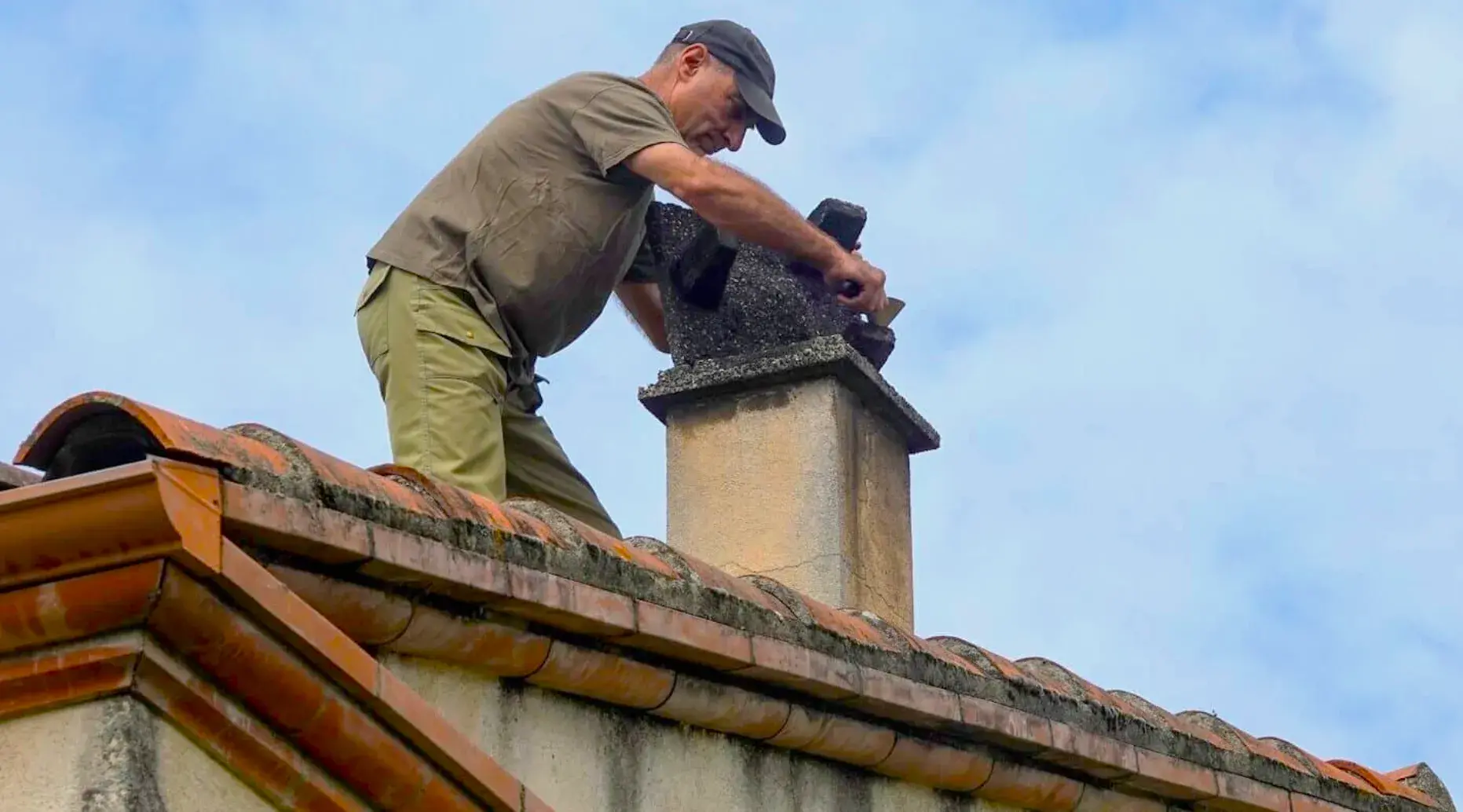 Chimney Cleaning provided by Top Hat Chimney And Roofing