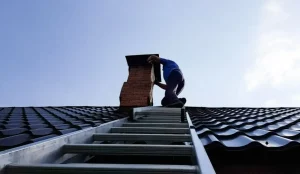 Chimney Cleaning provided by Top Hat Chimney And Roofing